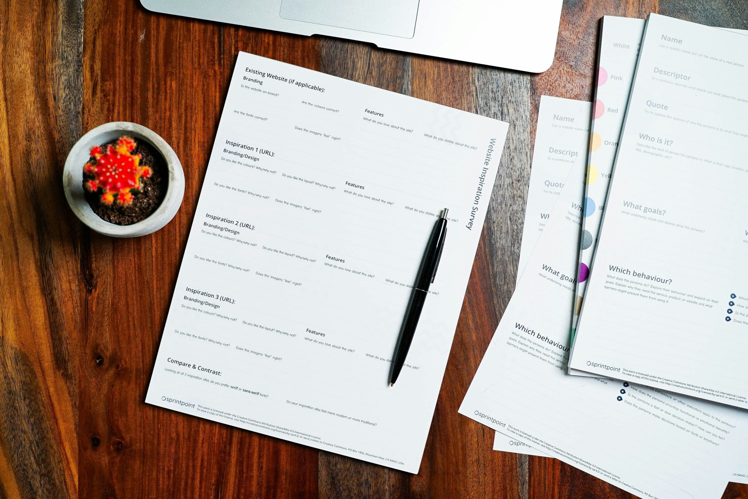 Desk with paperwork and pen, representing voter roll and residency record review