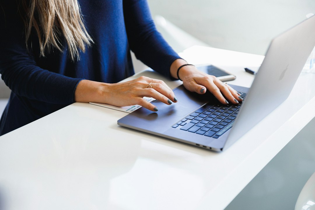 Nevada voter checking voter registration status online on a laptop