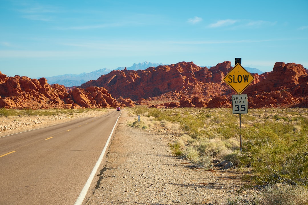 Desert highway road sign representing the distance rural and tribal Nevadans may travel to reach a DMV office